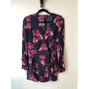 Navy romper with pink floral detail